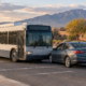 Albuquerque city vehicle crash claim scene with an unmarked bus and passenger car